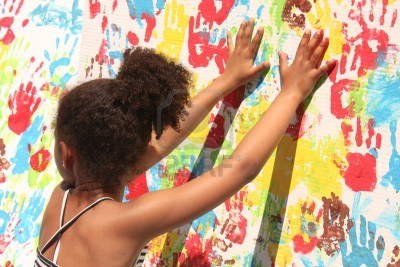 8822167-girl-playing-with-paint-handprints-in-different-colors-in-a-mural-funny-photo-of-a-children-s-activi